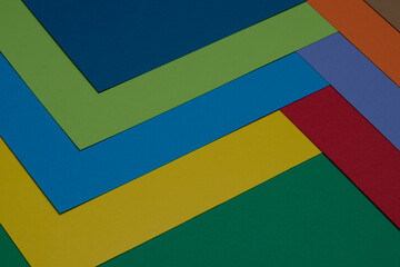 Multicoloured paper (poster board) sheets arranged in a zigzag pattern