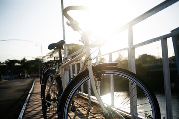 Naklejka na ściany i meble cycling in the city. summer day at bridge