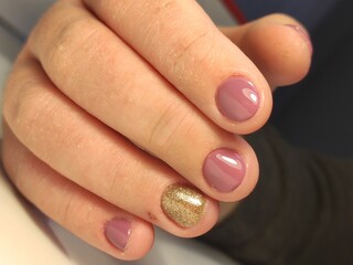 beautiful manicure of nails on the background of a fashionable