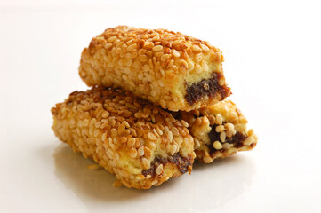 Eastern Zalatimo sweet dates baklava filled cookies mamoul sticks covered with sesame