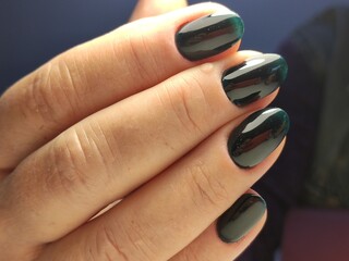beautiful manicure of nails on the background of a fashionable