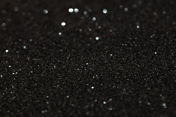 Black glitter textured patterned background