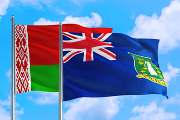 British Virgin Islands and Belarus national flag waving in the windy deep blue sky. Diplomacy and international relations concept.