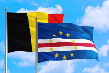 Cape Verde and Belgium national flag waving in the windy deep blue sky. Diplomacy and international relations concept.
