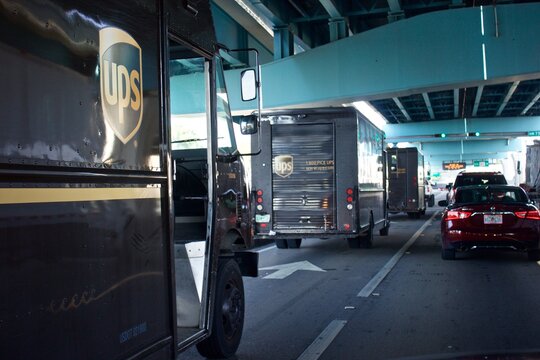 August 15,2019  Miami Florida  UPS delivery trucks, called package cars, fan out from distribution center to deliver packages to customers