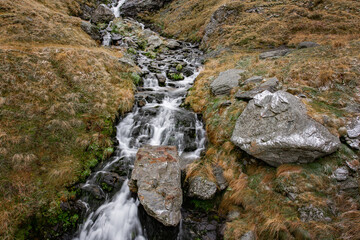 water fall in the mountains. winter landscape