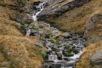 Obraz premium water fall in the mountains. winter landscape