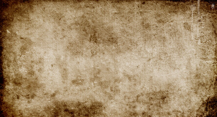 Dark grunge background, texture of old brown paper with spots and streaks