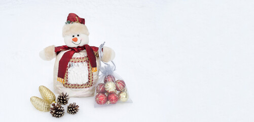 Christmas and New Years background card with copy space, snowman on snow background