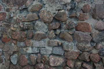 Castle wall made of old stones textures for design and photo background.