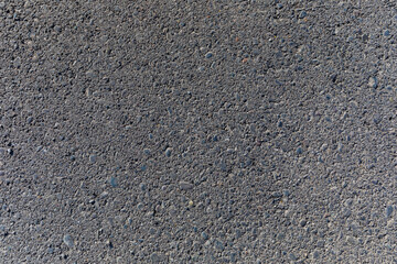 The texture of the freshly laid asphalt. Can be used as a background