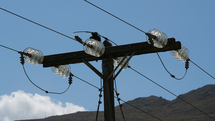 Low angle closeup of the powerline captured during the daytime