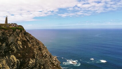 sea, ocean, landscape, coast, sky, water, beach, blue, nature, clouds, bay, cliff, view, lighthouse, rocks, rock, mountain, summer, panorama, island, shore, green, coastline, scenic, travel