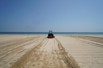 Cleaning work on an Atlantic beach