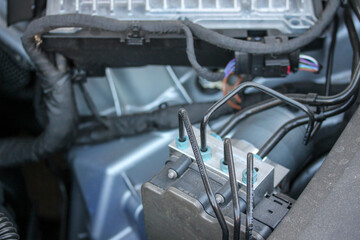 Fototapeta premium Various components inside a modern engine bay