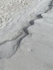 Fototapeta na wymiar textures in the sand on the beach