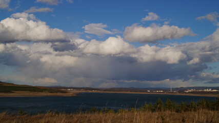 Obraz premium clouds over the river