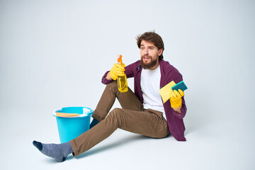 man on the floor with a blue bucket homework lifestyle professional