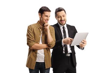 Businessman showing a tablet to a smiling young man