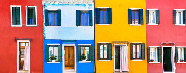 Most colorful town (places) . Burano fishing village with painted houses.  Island near  Venice. Italy travel and landmarks