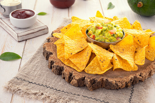 Traditional corn chip nachos with guacamole