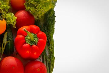 Background from juicy ripe and tasty vegetables with copy space