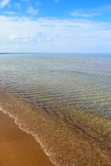Waves rolling in on the beach at Sauble Beach