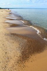 Waves rolling in on the beach at Sauble Beach