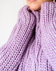 Fototapeta na wymiar pink woman cosy knitted woolen sweater 