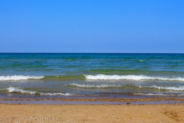 Waves rolling in on the beach at Sauble Beach