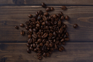 Scattered brown coffee beans top view