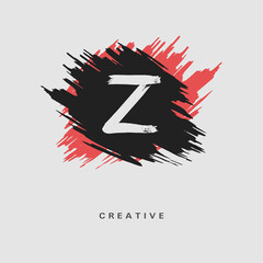 Hand drawn Letter Z Logo on colorful brush strokes background. Initial white paint brush stroke letter Z Logo Design. Creative template for logotype, emblem, monogram, jewelry, cosmetic or brand name.