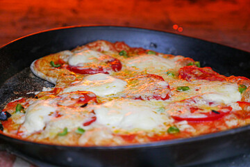 Pizza Cooking in Metal Pan