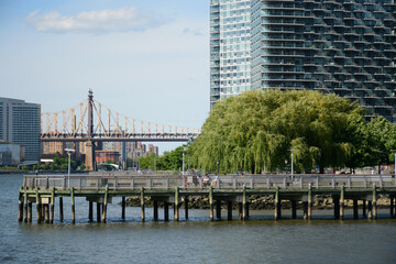 Fototapeta premium New York, USA - June 3, 2019: Pier in Gantry Plaza State Park in Queens