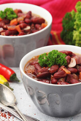Two bowls with traditional Georgian dish - lobio	