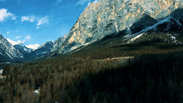 Aerial 4K Drone View of Fanes-Sennes-Prags Nature Park in the Dolomites, including Croda del Becco and Three Peaks Nature Park (Parco naturale Tre Cime) on a bright sunny spring day