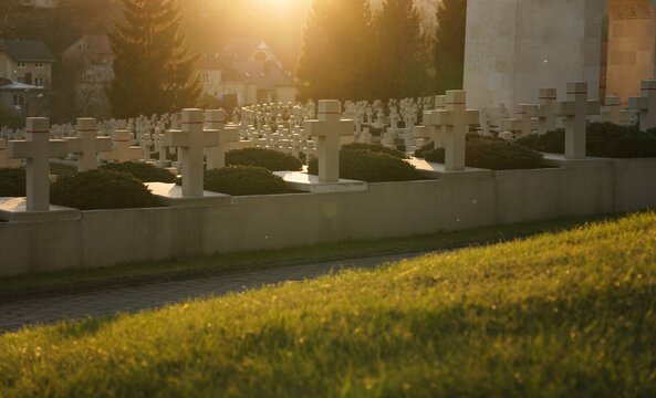 View of crosses grave stones on graves at sunset in Ukraine