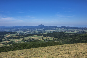 Beautiful highland landscapes in Volcans d'Auvergne regional Natural Park. Massif Central, Auvergne-Rhone-Alpes administrative region, France.