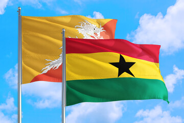 Ghana and Bhutan national flag waving in the windy deep blue sky. Diplomacy and international relations concept.