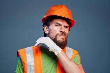 Emotional man on orange paint professional builders work