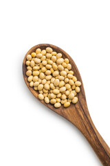 Dried soy beans in wooden spoon isolated on a white background.