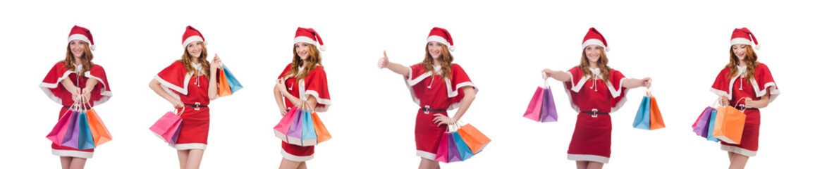Young woman in red santa costume on white