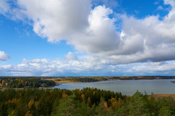 Turku archipelago on autumn time. Baltic sea coast with white clouds on sky.