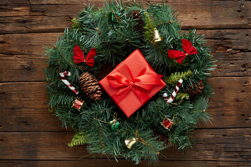 Christmas wreath on wooden background