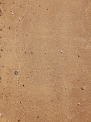 Sand Texture. Brown sand. Background from fine sand. Sand background