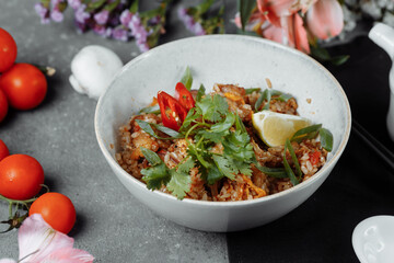 Thai rice with chicken and vegetables. place for inscription