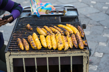 Stall of street food with fried bananas in the centre of Cuenca, Ecuador