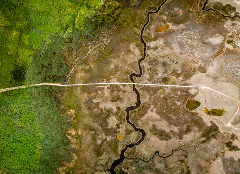 Aerial view of wooden platform bridge crossing swamps, Nin, Croatia.