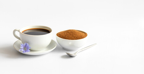 Chicory coffee and ground chicory root isolated on a white background. Healthy herbal drink. Copy space.