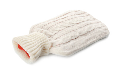 Hot water bottle with knitted cover isolated on white